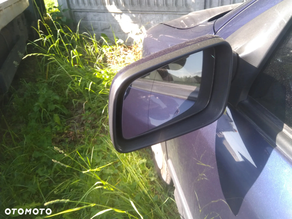 Opel Astra 1.6 lusterko lewe zewnętrzne granat metalic
