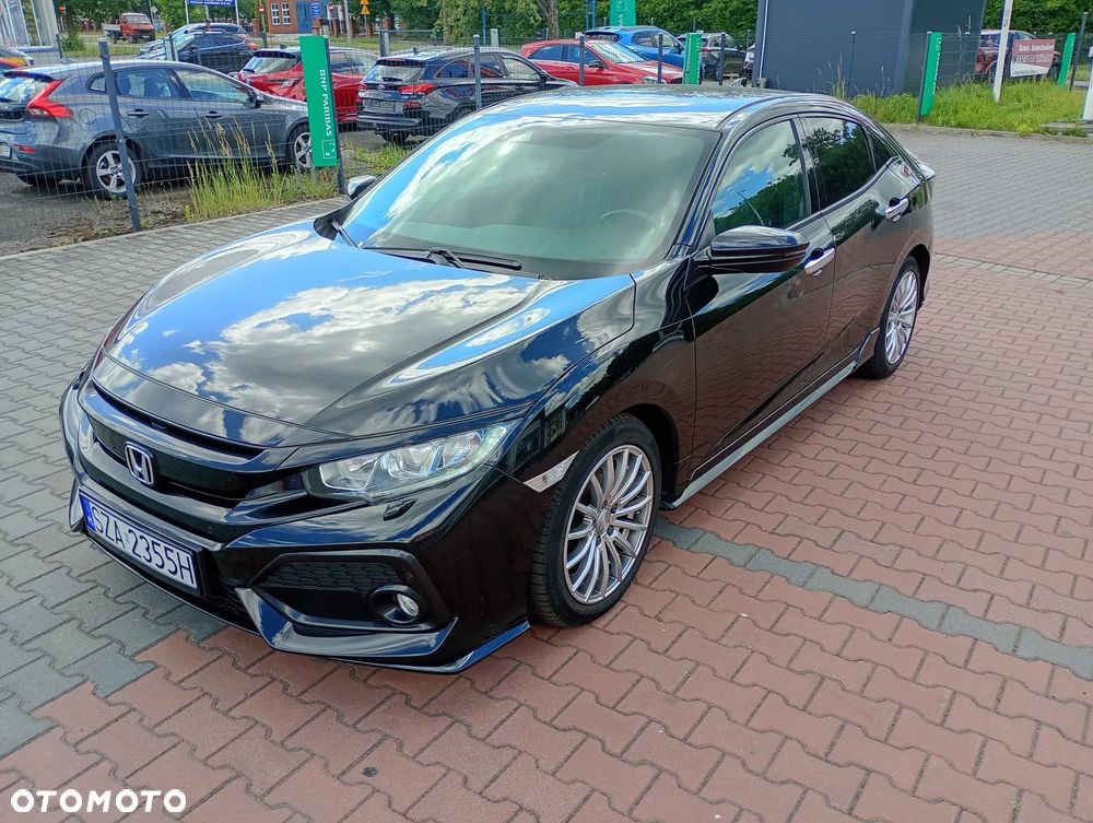 Honda Civic 1.0 i-VTEC Turbo CVT Elegance - 1