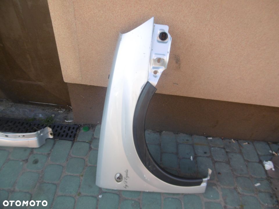 Błotnik prawy OPEL CORSA C COMBO C BEZ RDZY - 1