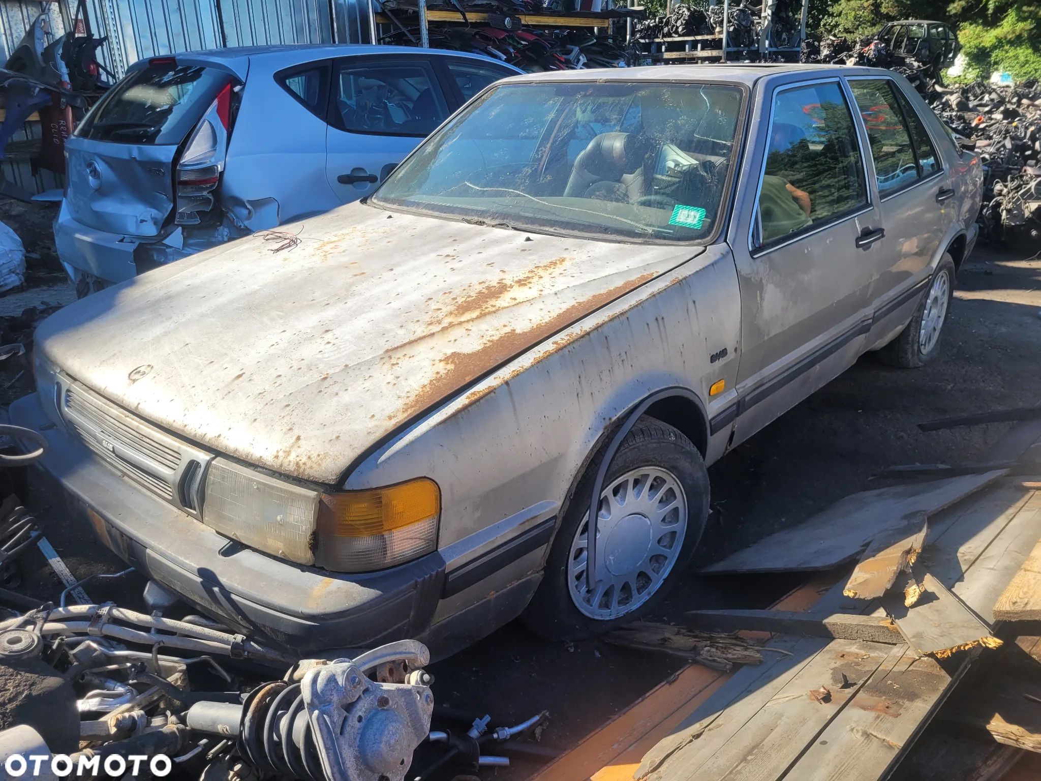 SAAB 9000 fotel fotele kanapa deska kokpit podsufitka boczek boczki klamka podłokietnik licznik prędkościomierz panel szyb - 1