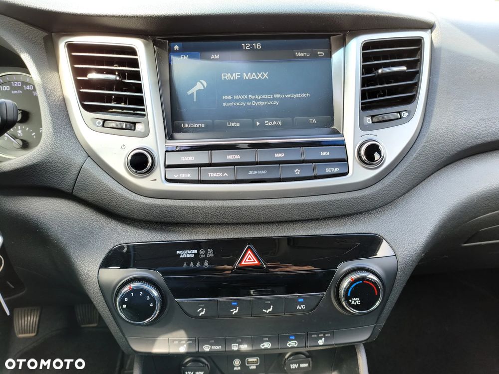 Hyundai Tucson blue 1.6 GDi 2WD Navi - 30