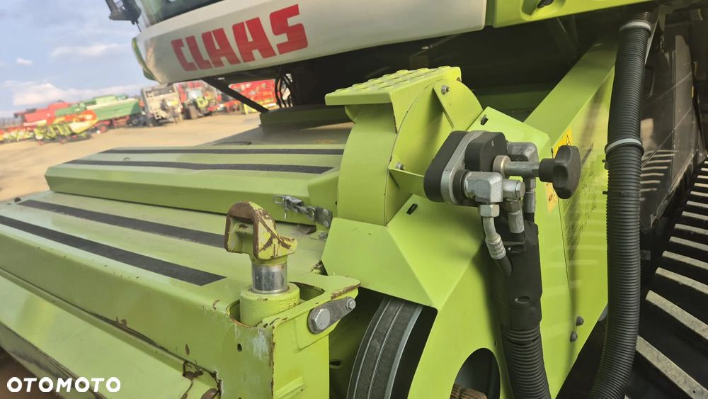 Claas Lexion 780TT(4X4) z hederem - 2