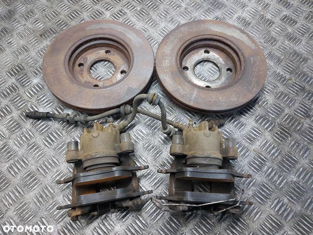 TARCZE HAMULCOWE PRZÓD + KLOCKI + ZACISKI FORD FOCUS MK1 1.6 16V - 2
