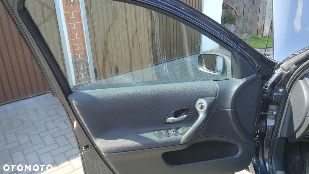 Renault Laguna 1.9 dCi FAP Emotion - 22