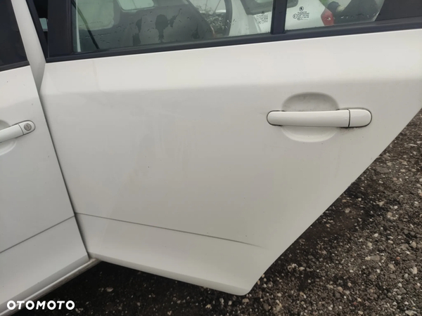 Skoda Fabia II lift kombi drzwi lewy tył LF9E