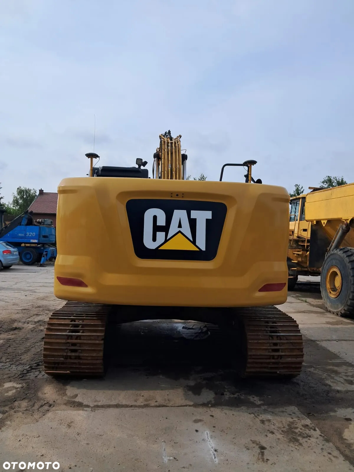 Caterpillar 323 - 9