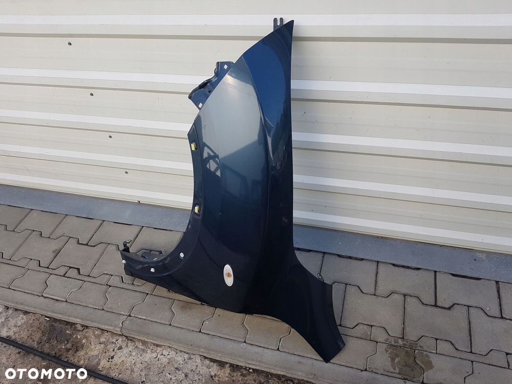 NISSAN JUKE 10-14r BŁOTNIK LEWY PRZÓD RAQG - 2