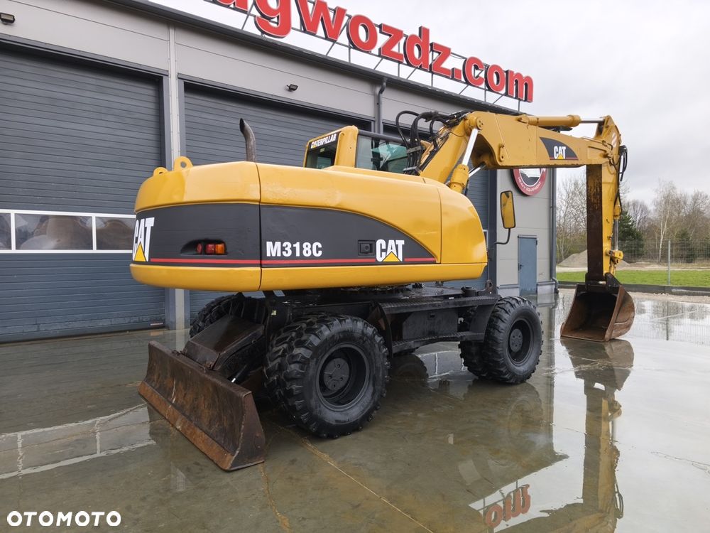 Caterpillar M318C - 3
