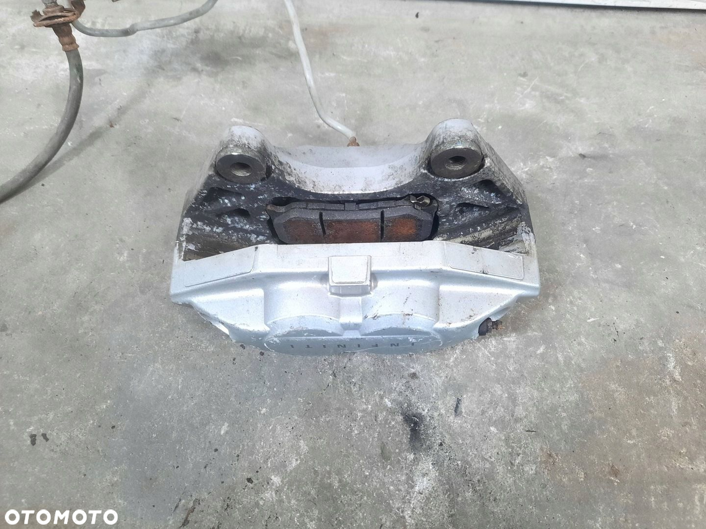 ZACISK HAMULCOWY PRAWY PRZÓD PRZEDNI INFINITI FX 30 II LIFT QX70 3.0D - 4