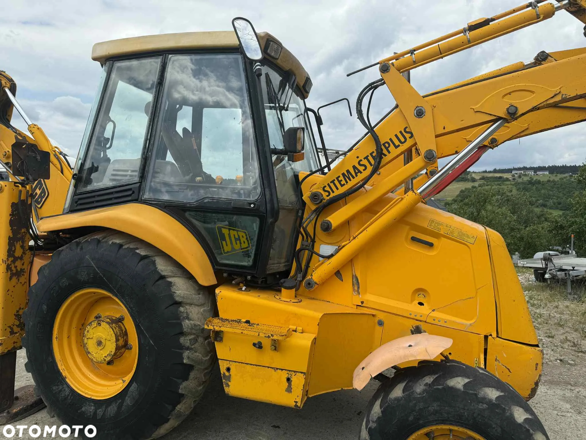 JCB koparko-ładowarka KOMATSU WB97 jcb 3cx - 15
