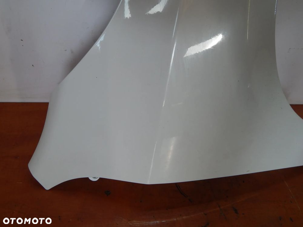 Błotnik prawy przód Volvo V60 S60 10-13 biały 614 Łuków części - 3