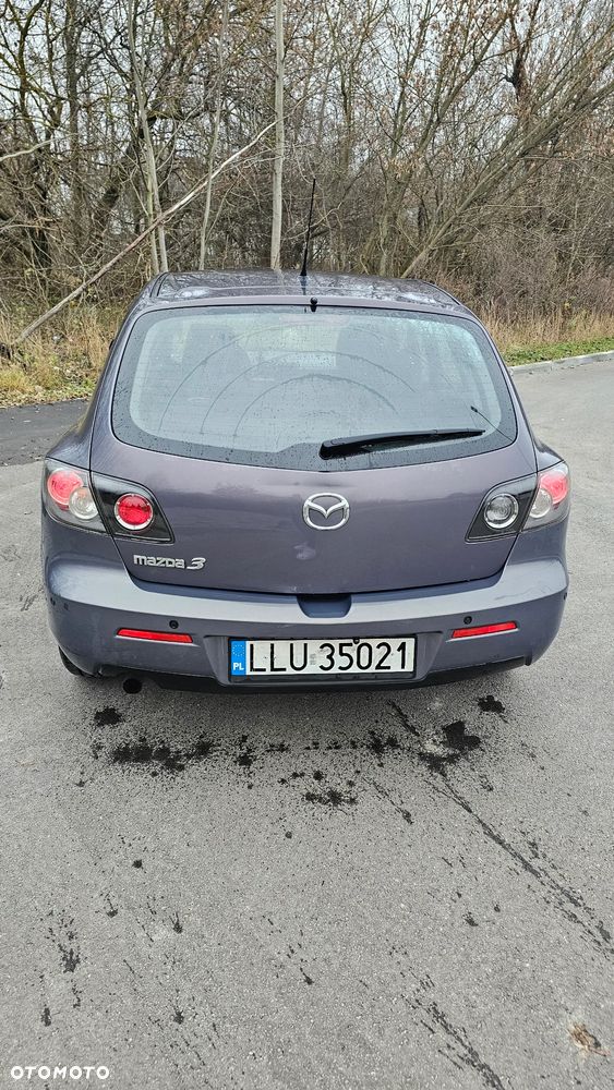 Mazda 3 1.6 Exclusive + - 7