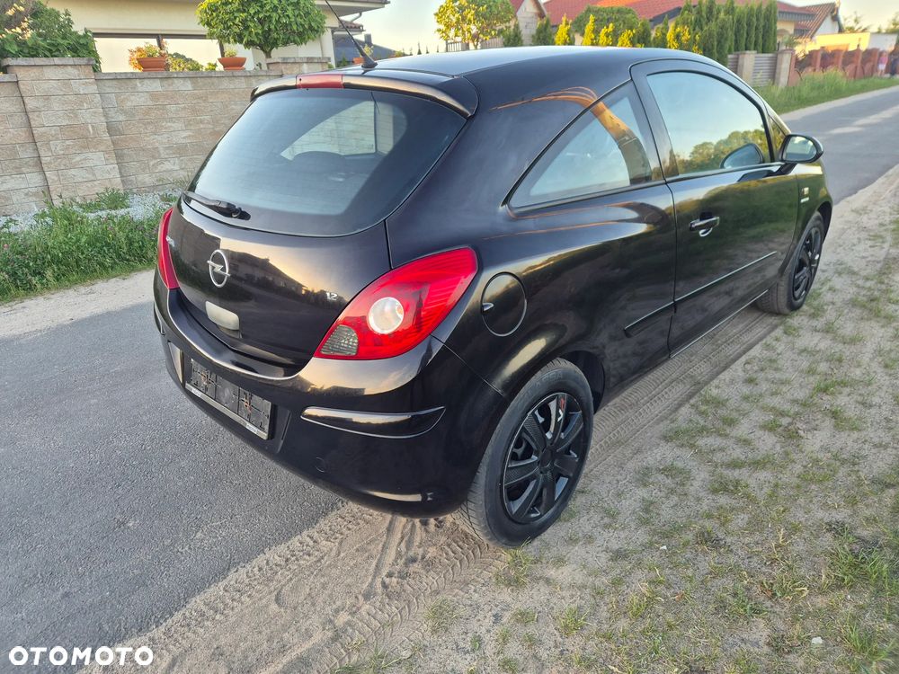 Opel Corsa 1.2 16V Cosmo - 7