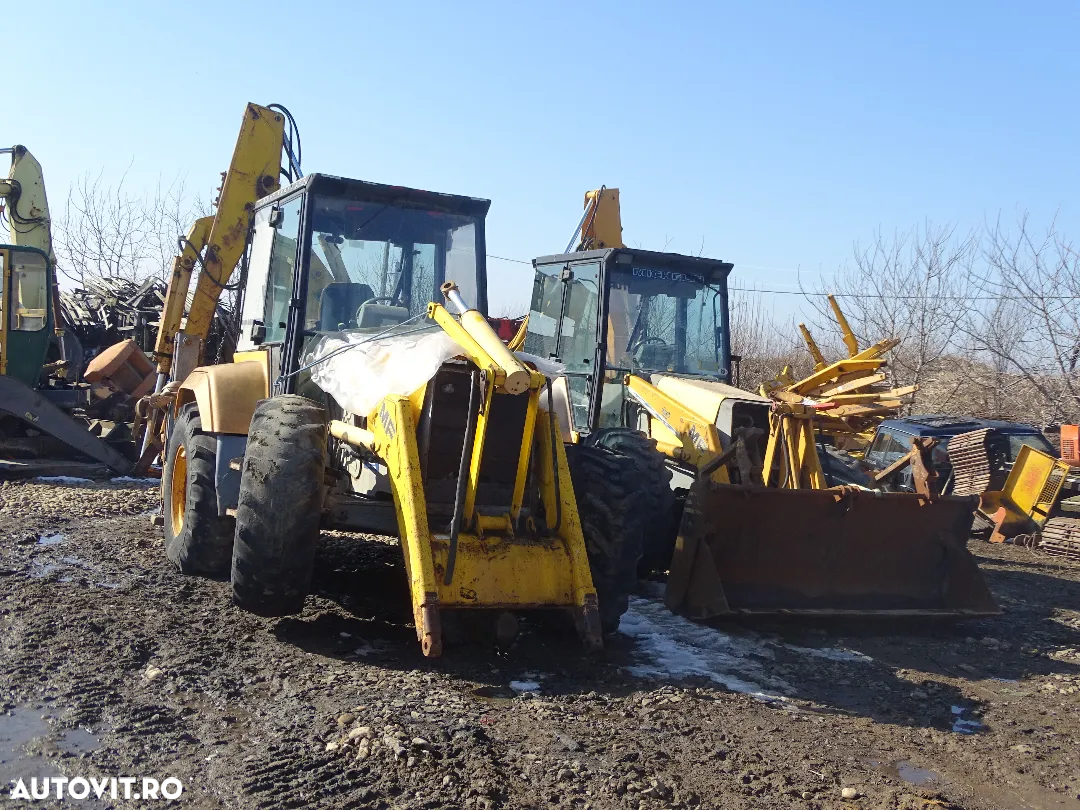Dezmembrez buldoexcavator MF 965 - 6