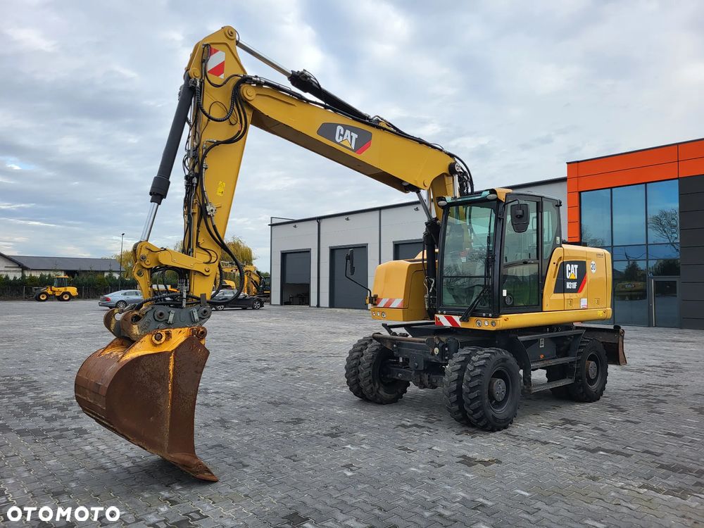 Caterpillar M 318 F / z Niemiec /