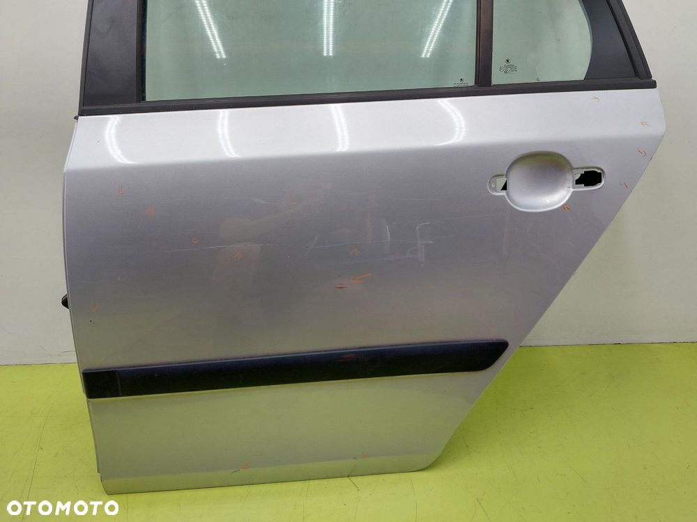 Drzwi tylne lewe tył SKODA FABIA II 2 LIFT 2010-2014 KOMBI LA7W SREBRNE - 2