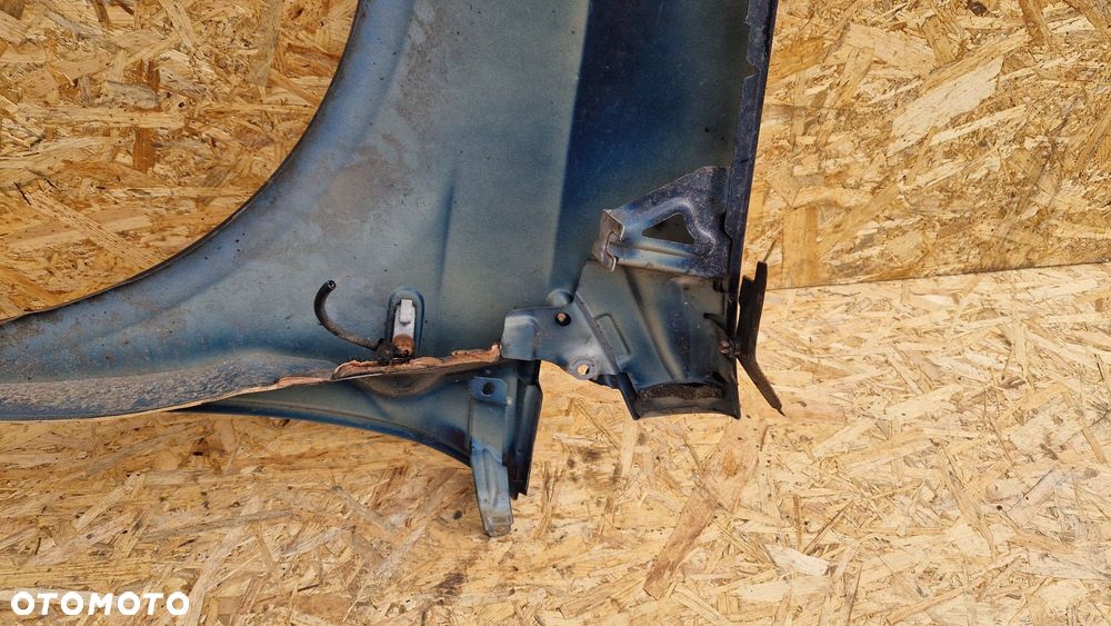 FIAT GRANDE PUNTO BŁOTNIK PRZÓD PRZEDNI PRAWY KOD LAK. 475/ A - 10