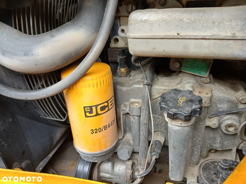 JCB 4CX/JOYSTICK/NOWE OPONY - 34