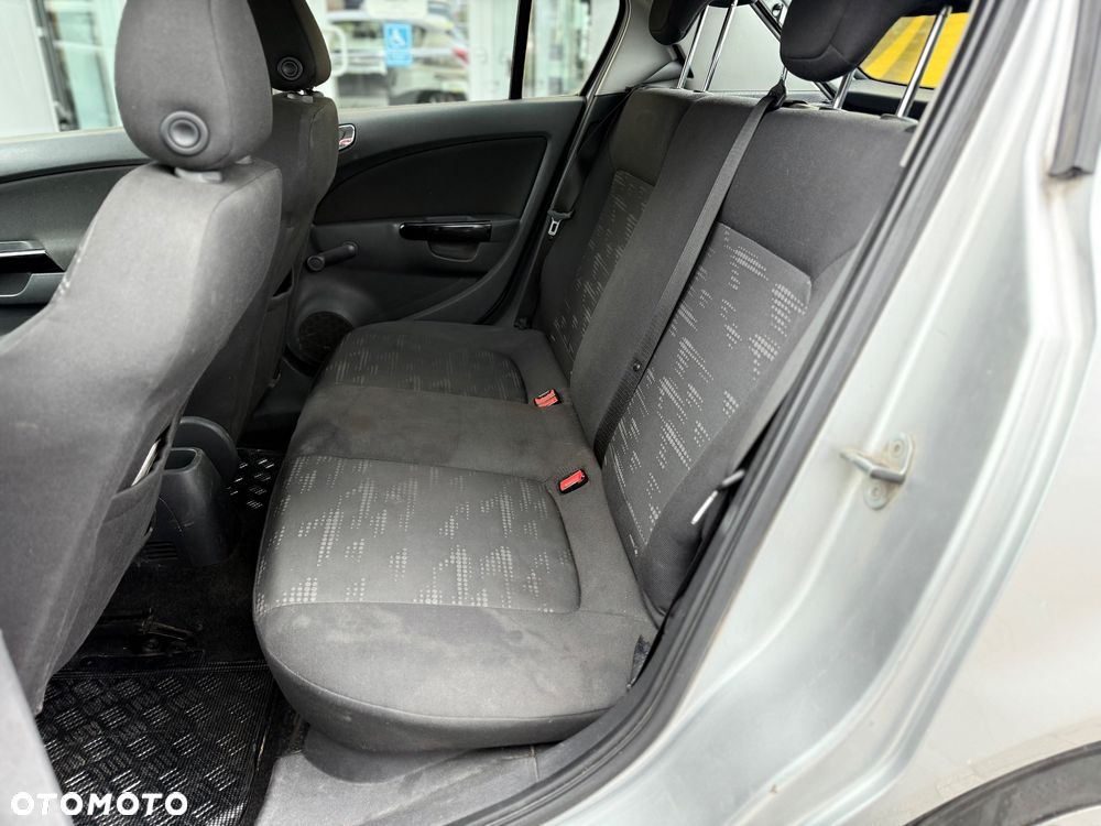 Opel Corsa 1.2 16V Cosmo - 11