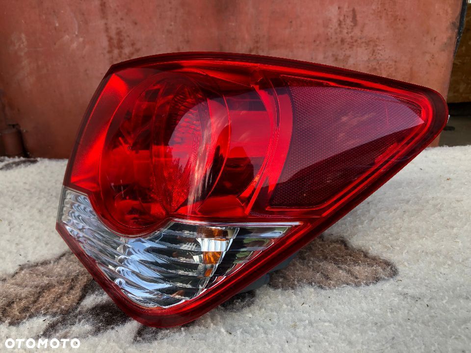 CHEVROLET CRUZE 2008-> LAMPA PRAWY TYŁ TYLNA SEDAN - 2