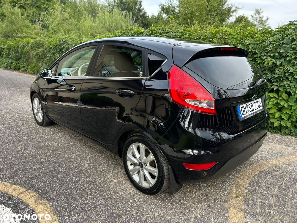Ford Fiesta 1.4 Ghia - 10