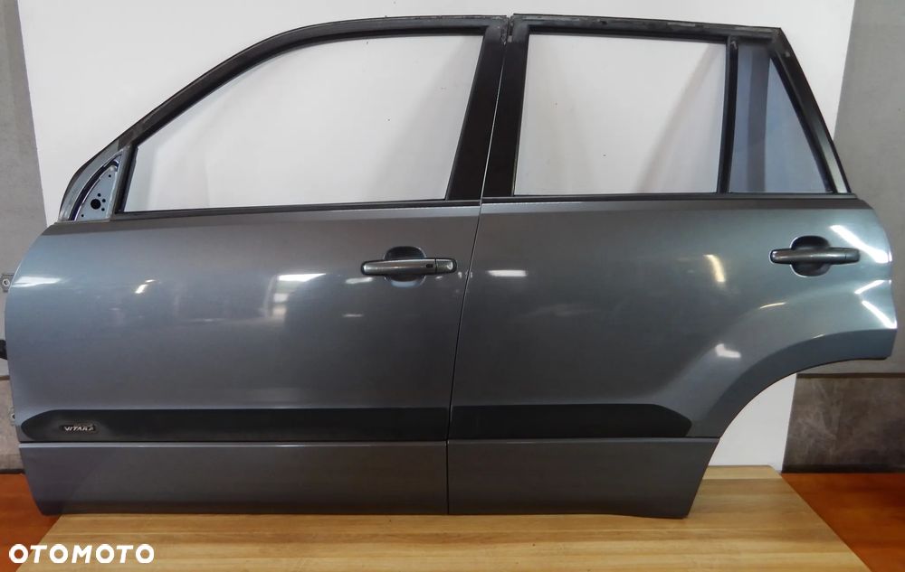 Drzwi lewy przód tył Suzuki Grand Vitara II 05-14 ZY4 niebieski Łuków części