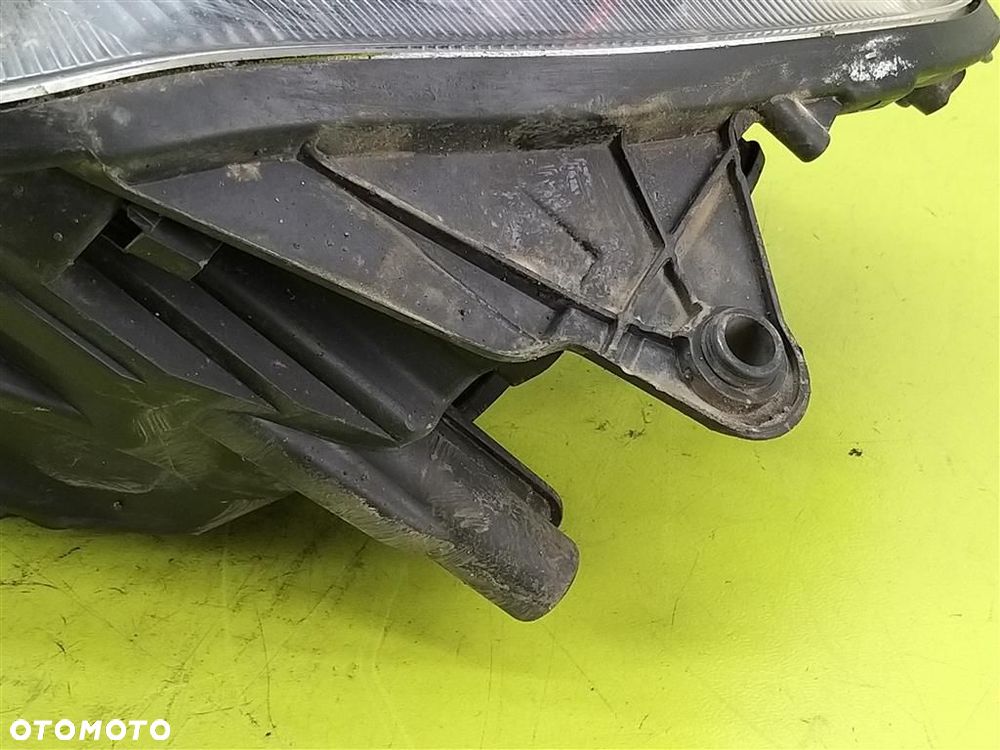 Reflektor lampa przód lewa Skoda Fabia II 2007-2014 5J1941015D HELLA - 2