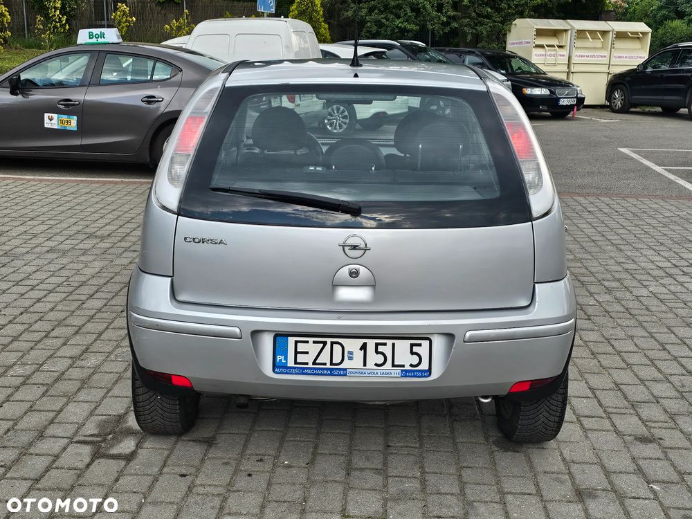Opel Corsa 1.0 12V Edition mit TomTom GO - 12