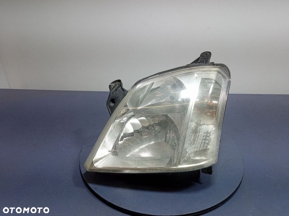 OPEL MERIVA A REFLEKTOR LEWY LAMPA EU 93321052 - 1