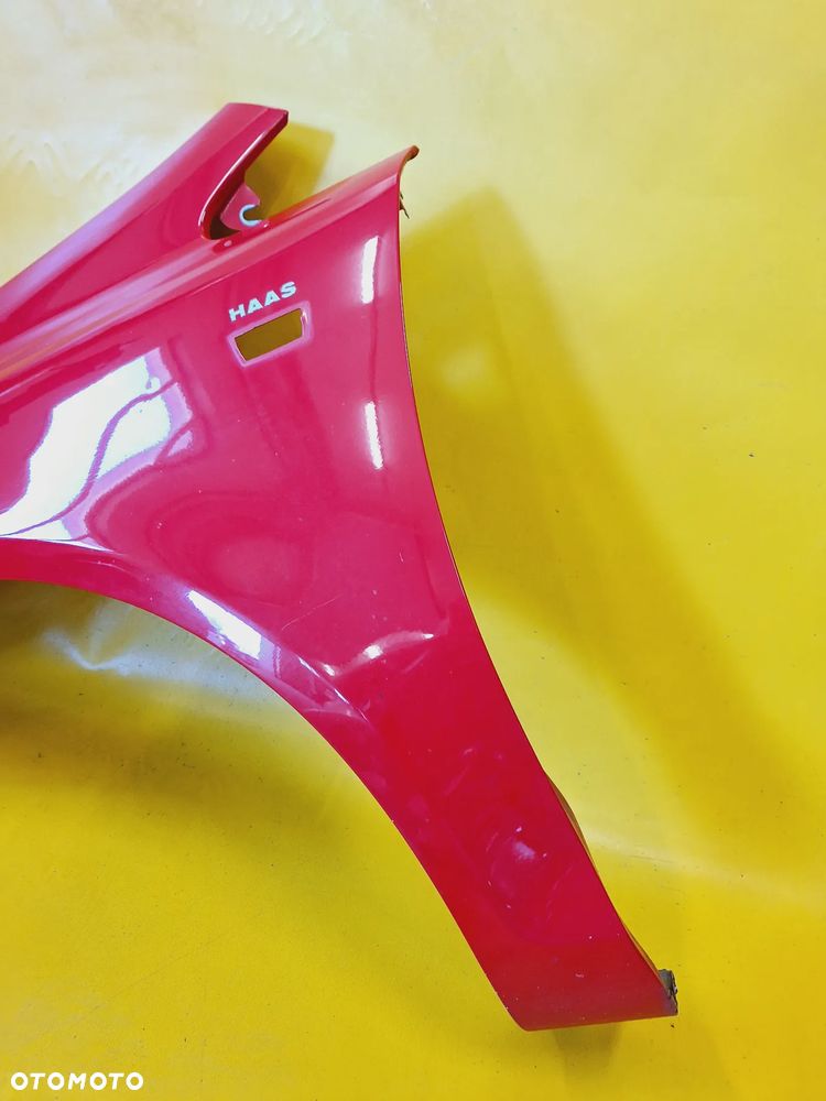 BŁOTNIK LEWY PRZÓD PRZEDNI OPEL CORSA D 3D HB 06-11 LAK: Z547 NR653 - 3