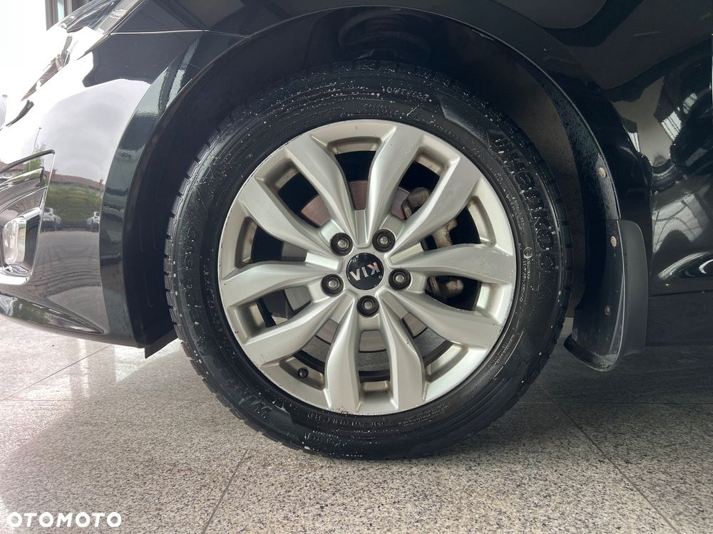 Kia Optima 2.0 L - 8