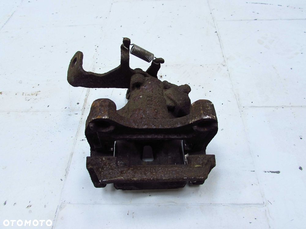MAZDA CX-5 AWD 12-17 ZACISK HAMULCOWY TYL PRAWY 4X4 - 4