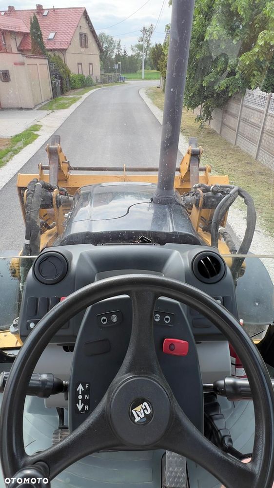 Caterpillar 428E - 25