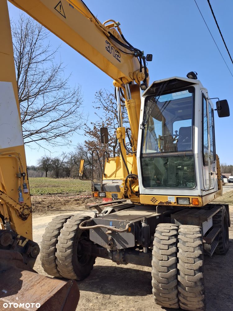 Liebherr A312 CAT JCB - 13