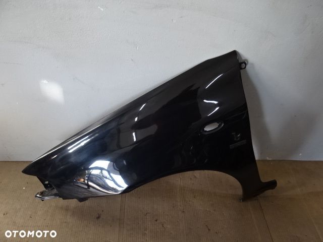 BŁOTNIK LEWY PRZÓD PRZEDNI FIAT PUNTO I CABRIO 93-99 BERTONE NR433 - 1