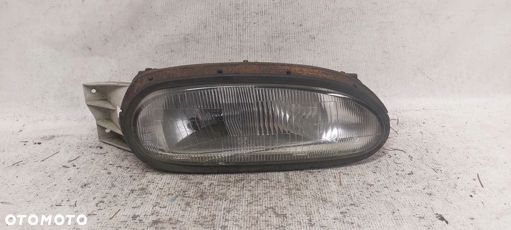 .  PRZOD PRZEDNIA LAMPA PRAWA NISSAN  100NX - 1