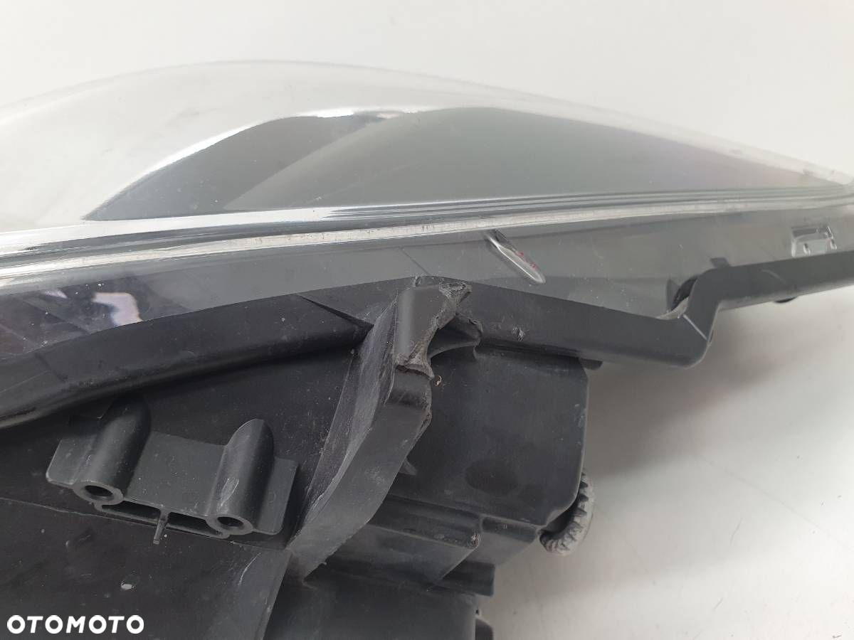 LAMPA PRZÓD LEWA SOCZEWKA EUROPA TOYOTA YARIS III LIFT 2014 - 10