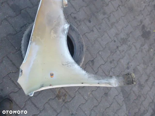 BŁOTNIK LEWY PRZÓD LEWY PRZEDNI DAEWOO KALOS KOLOR 95U - 11