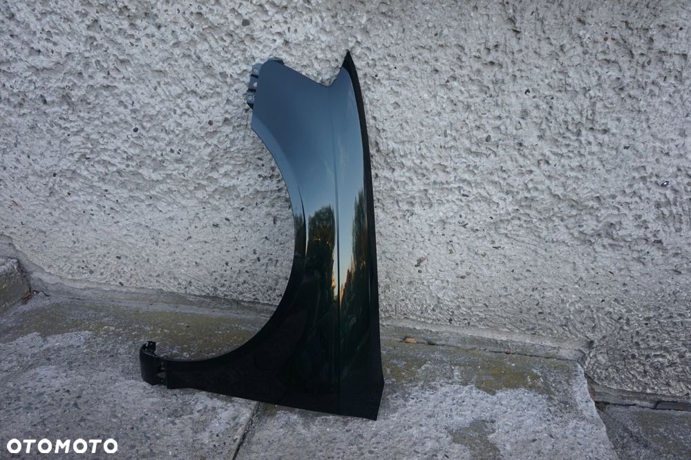 BŁOTNIK PRZEDNI LEWY AUDI A3 8P LIFT LZ6E 08/12r - 2