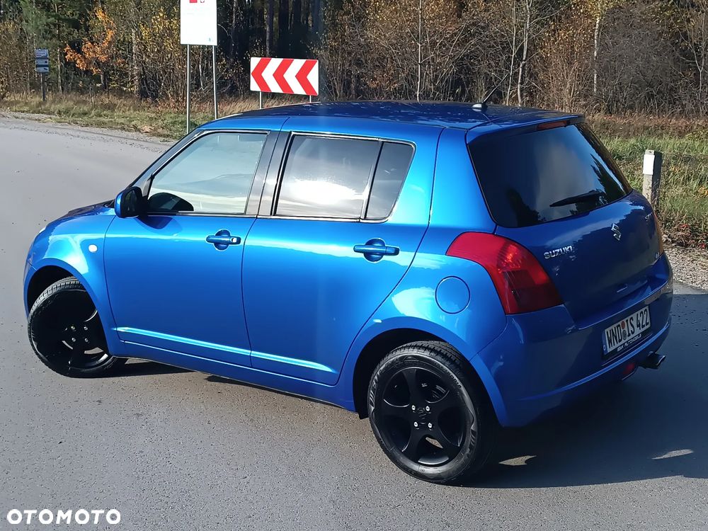 Suzuki Swift 1.2 4x4 Club - 13