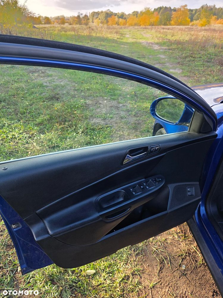Volkswagen Passat 2.0 TDI Highline - 14