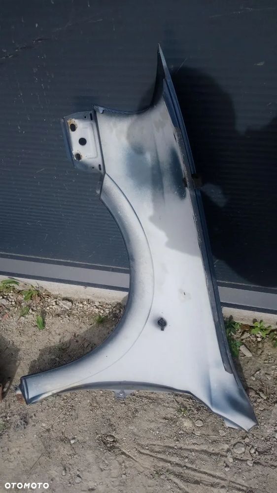 BŁOTNIK ASTRA II PRAWY LEWY PRZÓD - 7