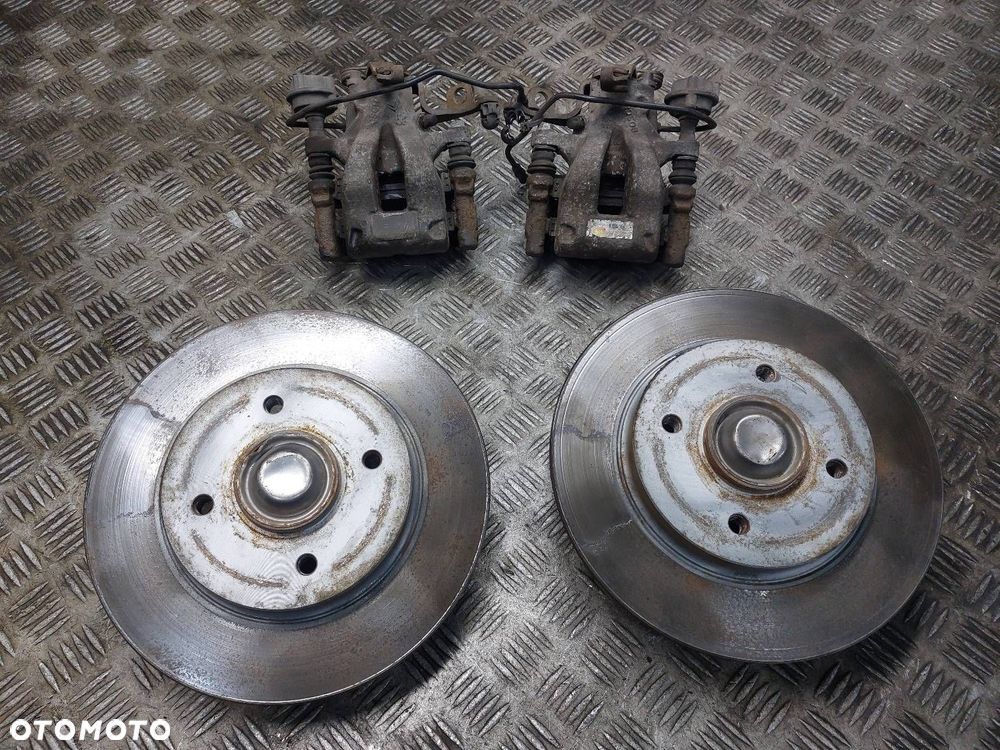 TARCZE HAMULCOWE TYŁ PIASTY + KLOCKI + ZACISKI CITROEN C4 PICASSO I - 1