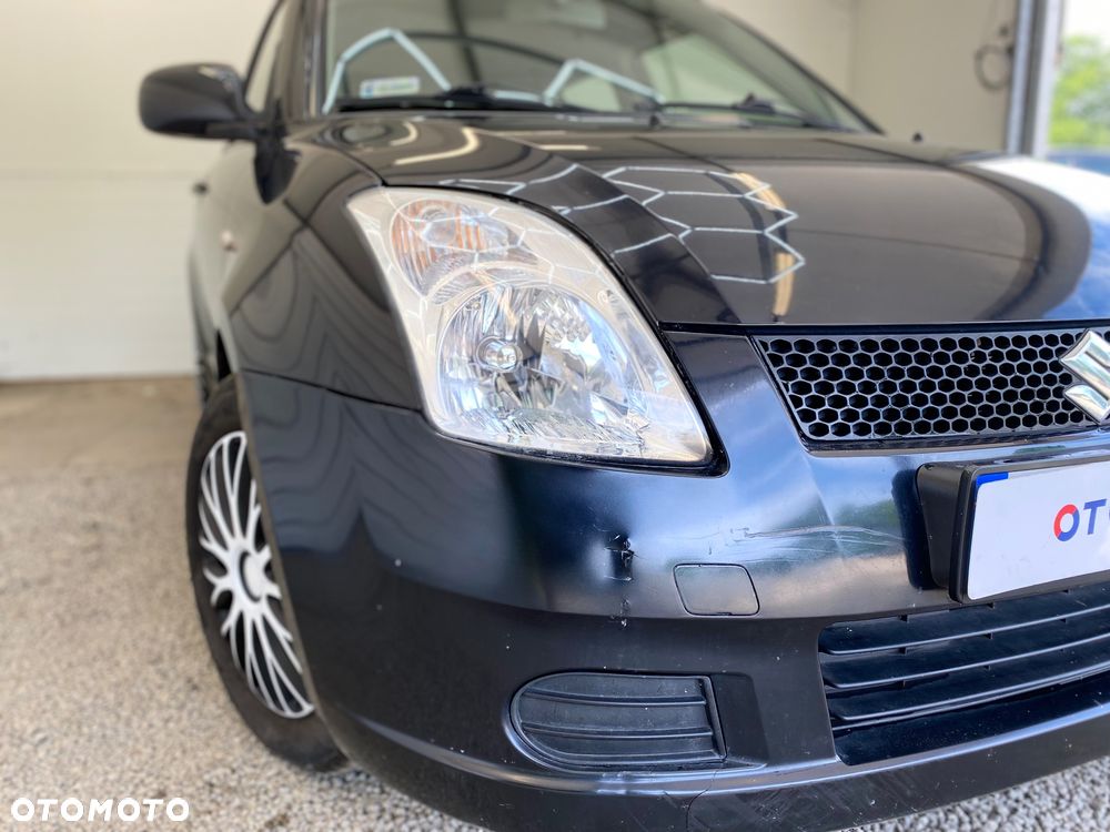 Suzuki Swift 1.3 Club - 18