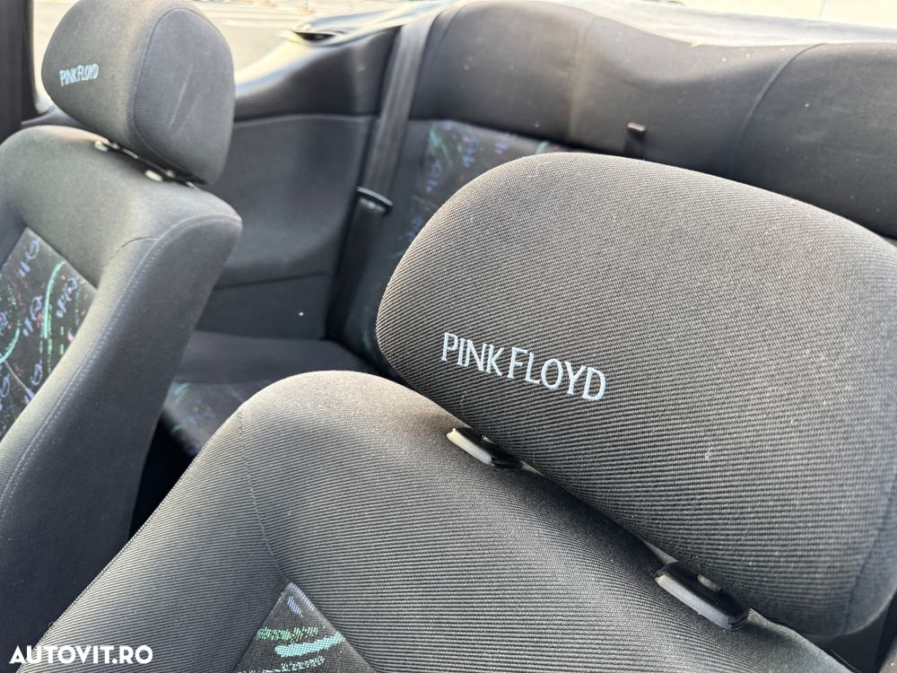 Ford Fiesta 1.4i Ghia - 8