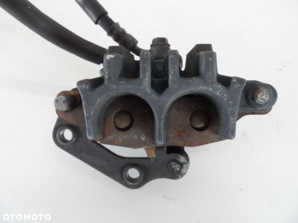 KAWASAKI ER6N zacisk hamulcowy przód P,L - 8