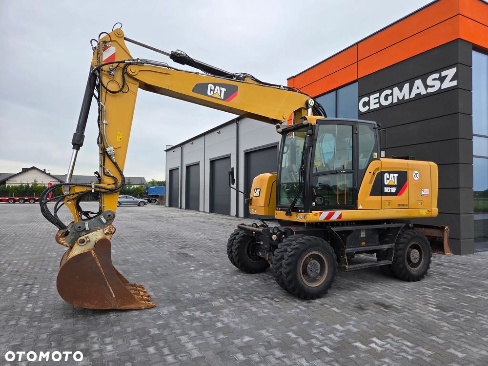 Caterpillar M318F / z Niemiec / - 1