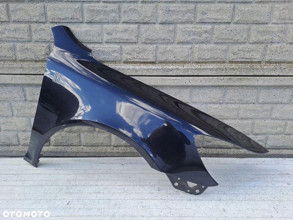 skoda octavia ii 2 lift 08-13 błotnik prawy przód oryginał - 1