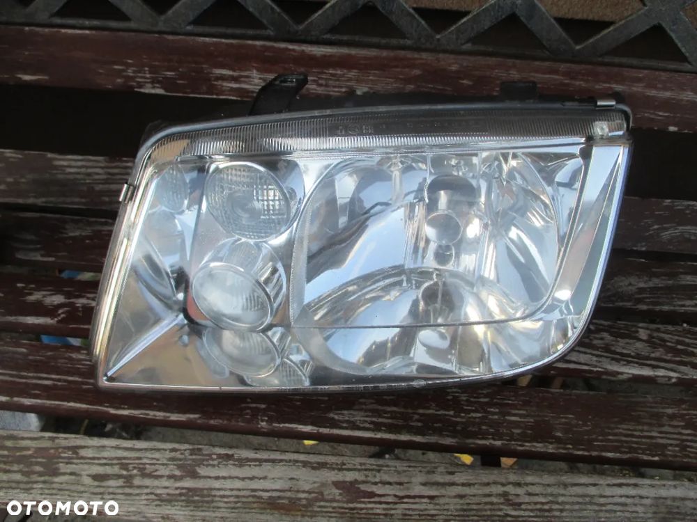 lampa VW Bora lewa Hella Europa - 1