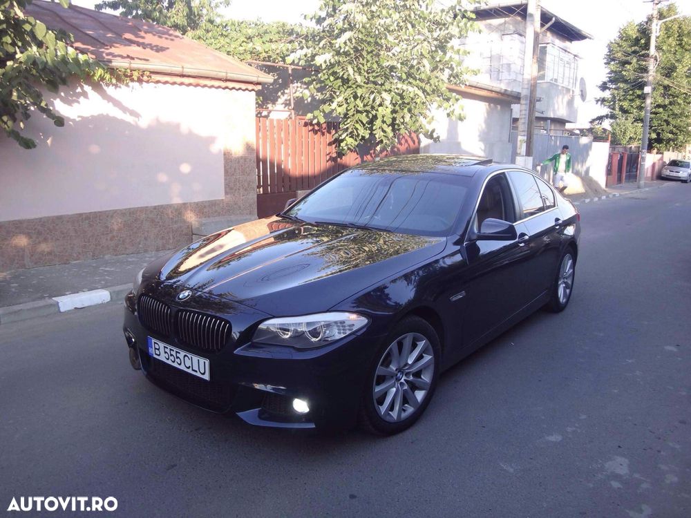 BMW 5 Series 2010 — imagine 12